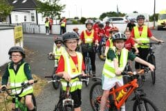 Liam and Tomas Collins and Jamie Murphy, Caherlistrane among the many cyclists lining up to take part in the Castlehackett 8k.